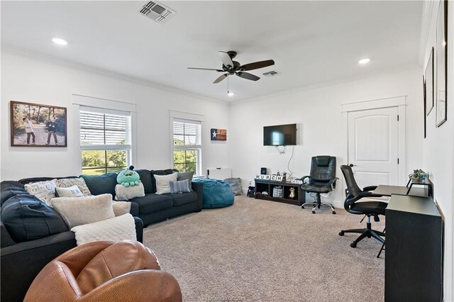 carpeted living room featuring ceiling fan and ornamental molding