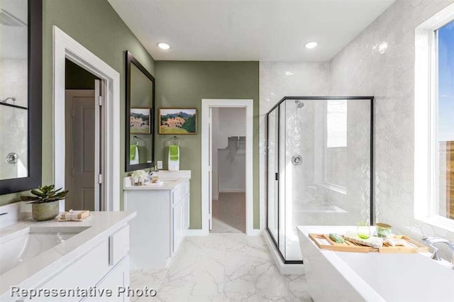 bathroom featuring vanity and plus walk in shower