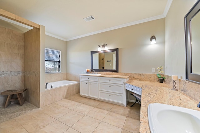 bathroom featuring tile patterned flooring, crown molding, tiled bath, and vanity