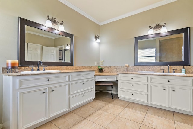 bathroom featuring crown molding, tile patterned floors, and vanity