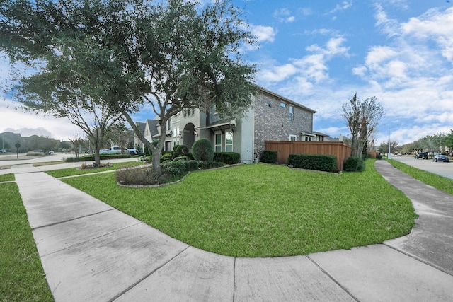 view of home's exterior featuring a lawn