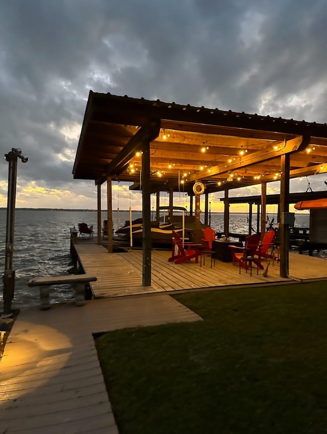 dock area with a water view