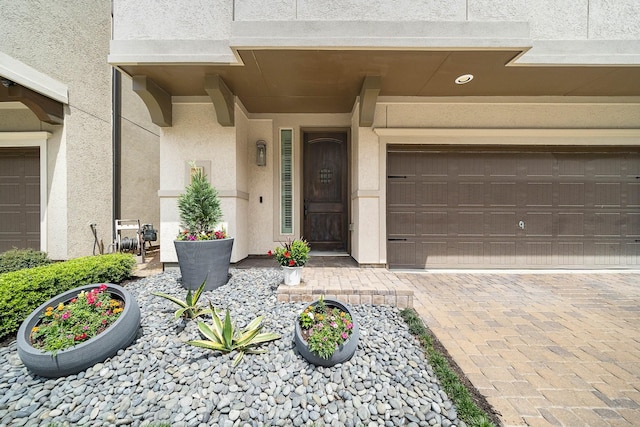 10812 Kyler Oaks Pl, Houston, TX 77043 - property entrance with stucco siding and driveway