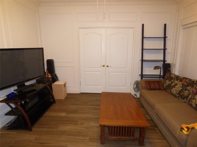 living room featuring dark wood-type flooring