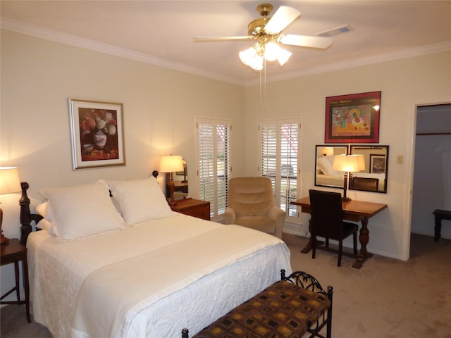 carpeted bedroom with crown molding and ceiling fan