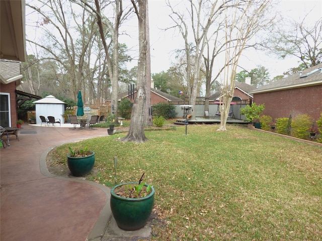 view of yard featuring a gazebo and a patio area