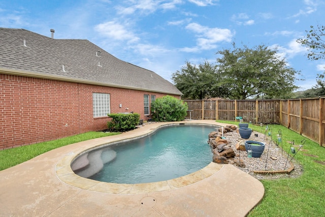 view of pool with a fenced backyard and a fenced in pool