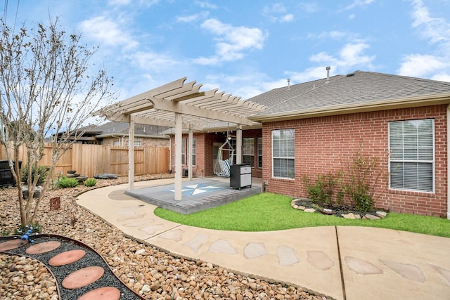 exterior space featuring a pergola and a patio area