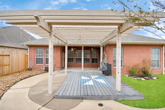 view of patio with fence and a pergola