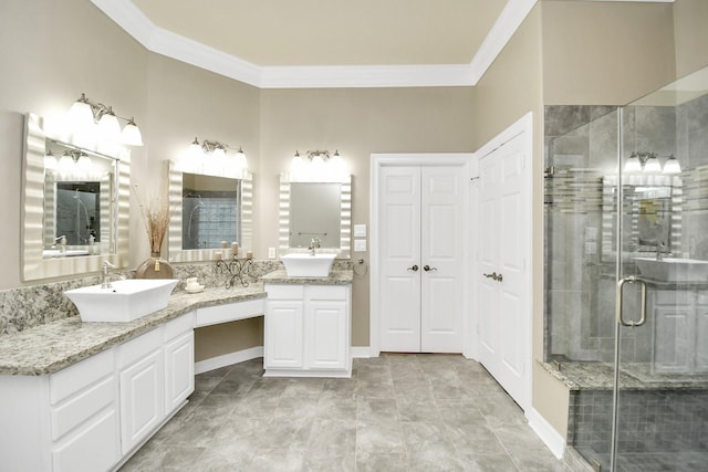 bathroom featuring ornamental molding, vanity, and walk in shower