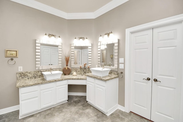 bathroom featuring vanity and crown molding