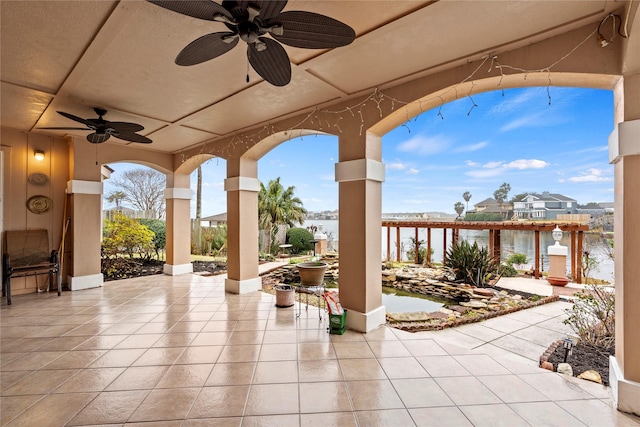 view of patio featuring a water view