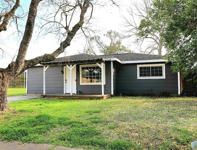 ranch-style house with a front yard