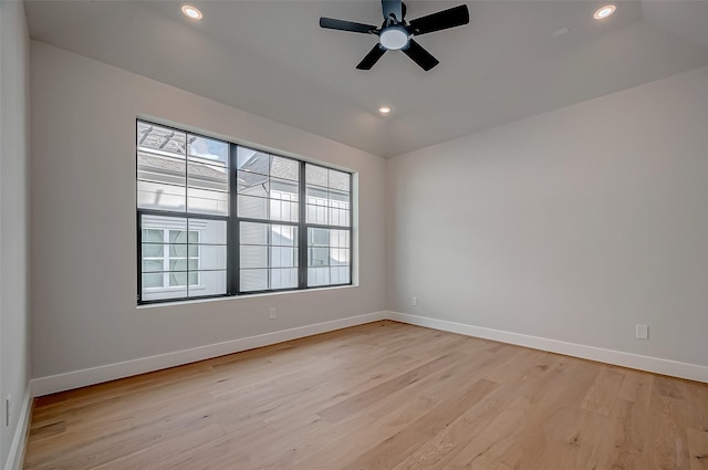 unfurnished room with light wood-style floors, ceiling fan, baseboards, and recessed lighting