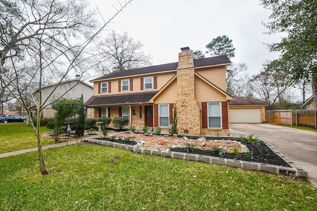 view of front of house with a garage, brick siding, a chimney, and a front lawn