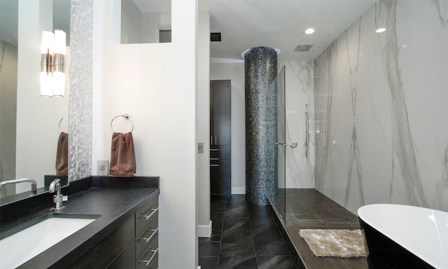 bathroom with walk in shower and vanity