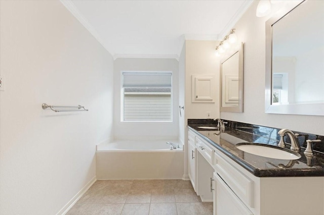 bathroom featuring crown molding, vanity, tile patterned flooring, and a bathtub