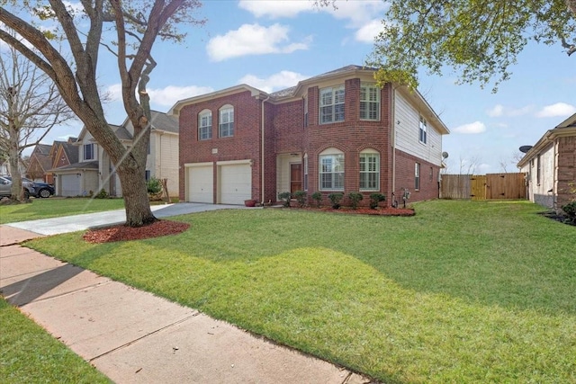 view of front of house featuring a garage and a front lawn