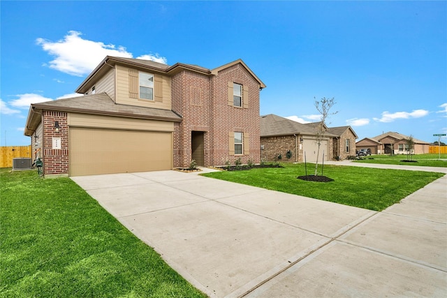 view of front of home featuring a garage, central AC, and a front lawn