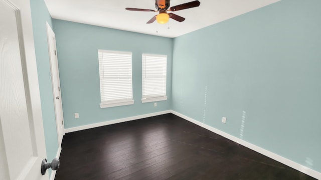 spare room featuring hardwood / wood-style flooring and ceiling fan