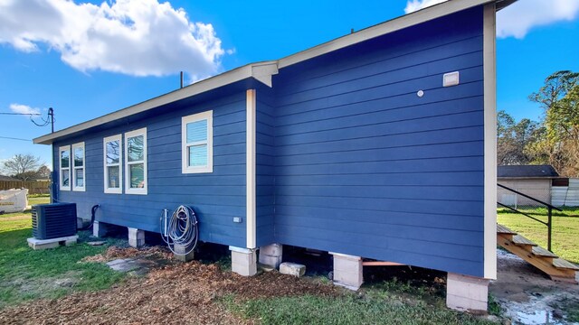 view of home's exterior with central AC unit