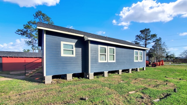 view of home's exterior featuring a lawn