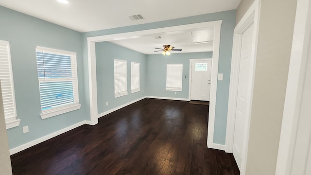 entrance foyer with ceiling fan and dark hardwood / wood-style floors