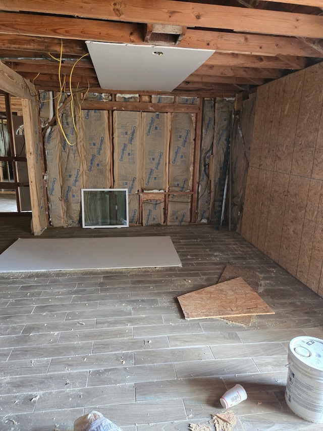 unfinished basement featuring wood finished floors