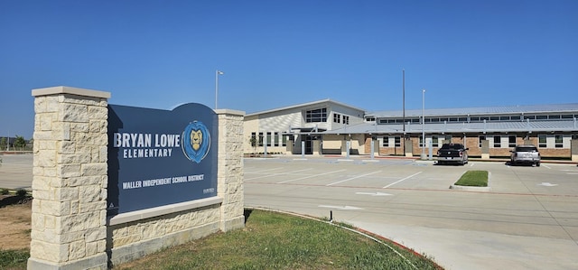 exterior space featuring uncovered parking