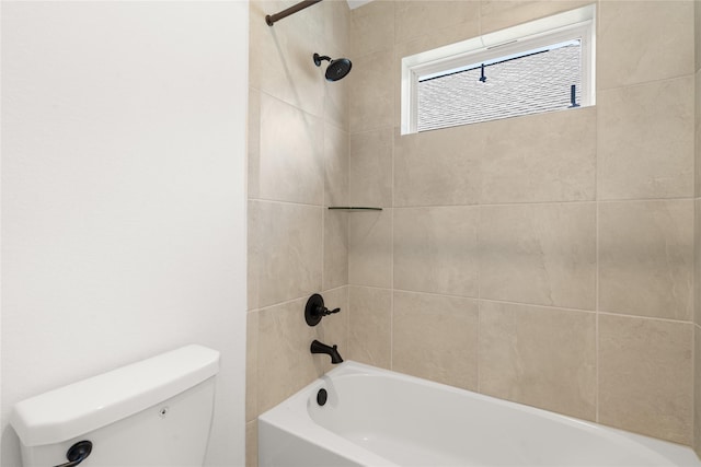 bathroom with toilet and tub / shower combination