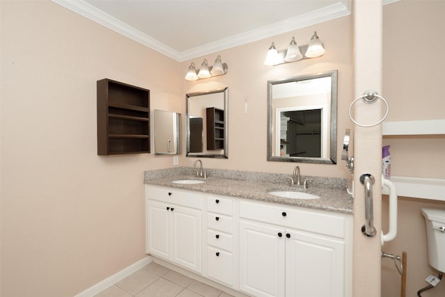 bathroom featuring vanity, tile patterned floors, ornamental molding, and toilet