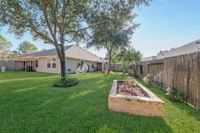 view of yard with an outdoor fire pit