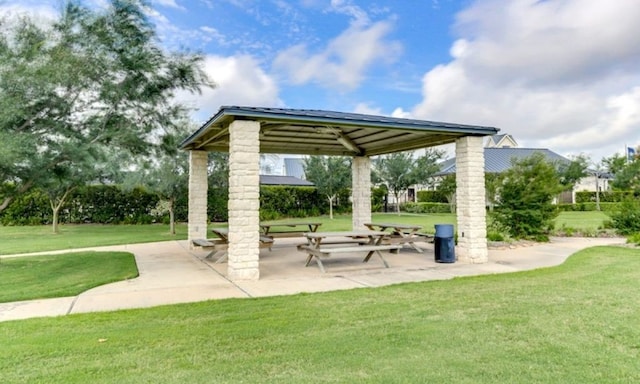 view of property's community featuring a gazebo and a yard