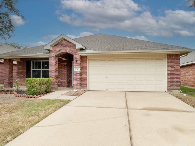 ranch-style home with a garage