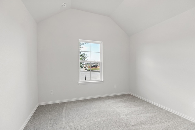 5830 Westwood Shore Dr, Katy, TX 77493 - carpeted spare room featuring vaulted ceiling and baseboards