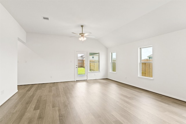 5830 Westwood Shore Dr, Katy, TX 77493 - spare room with a ceiling fan, wood finished floors, and vaulted ceiling
