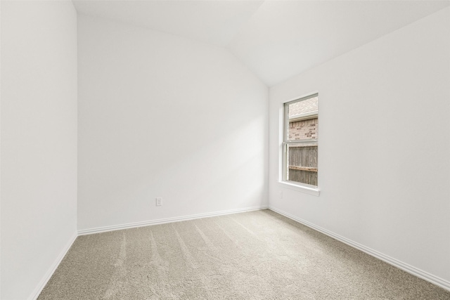 5830 Westwood Shore Dr, Katy, TX 77493 - spare room featuring carpet flooring and lofted ceiling