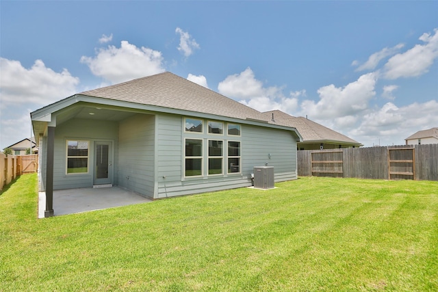 5830 Westwood Shore Dr, Katy, TX 77493 - back of property with a patio area, a fenced backyard, and roof with shingles