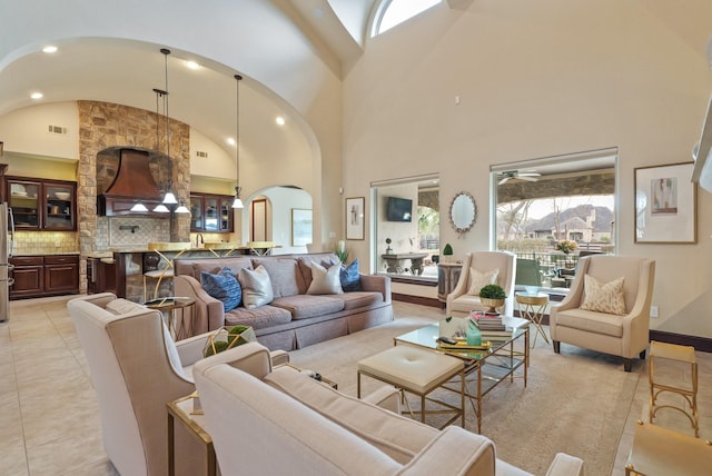 tiled living room with vaulted ceiling