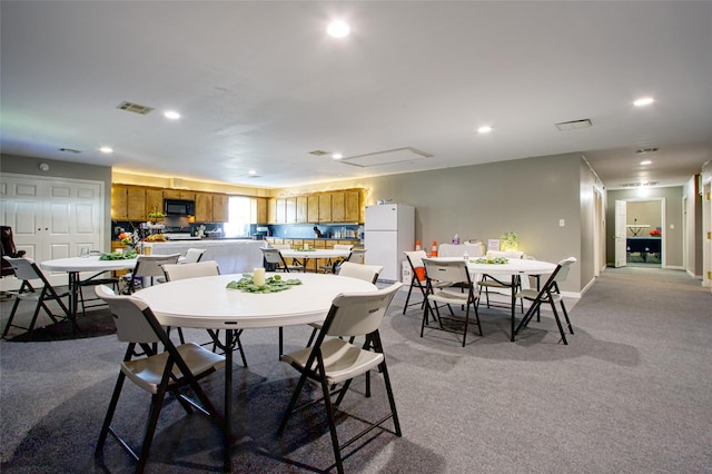 view of carpeted dining room