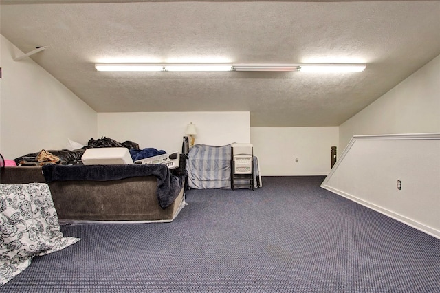 carpeted bedroom featuring lofted ceiling and a textured ceiling