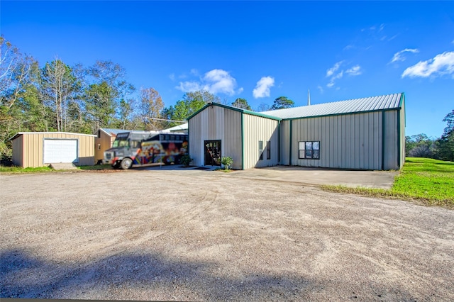 view of outdoor structure featuring a garage