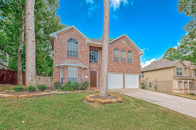 view of front of house with a garage and a front yard