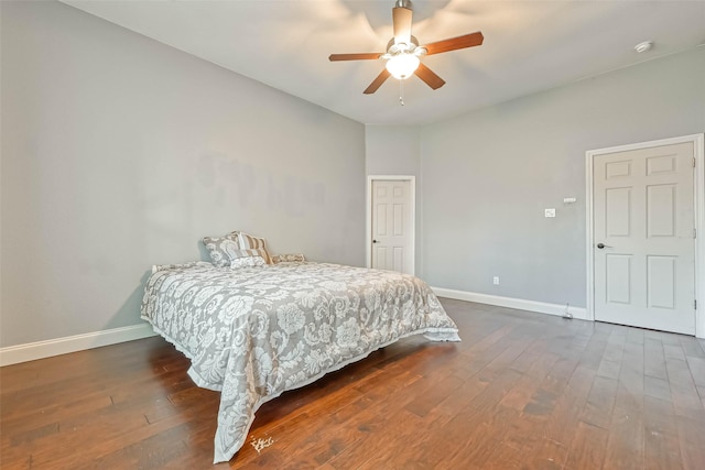 bedroom featuring dark wood-type flooring and ceiling fan