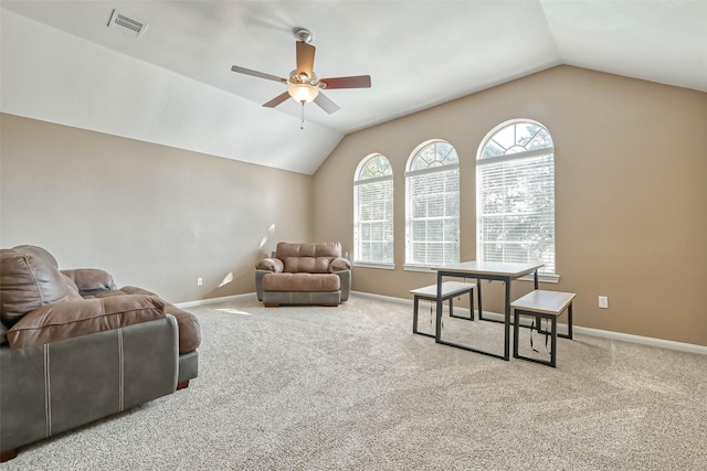 carpeted living room featuring lofted ceiling and ceiling fan