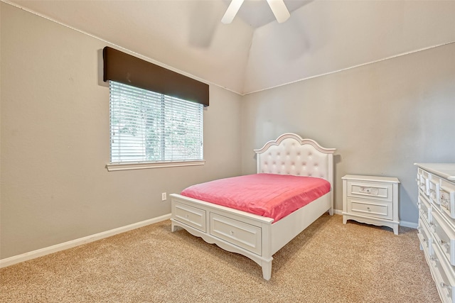 bedroom with light carpet, vaulted ceiling, and ceiling fan