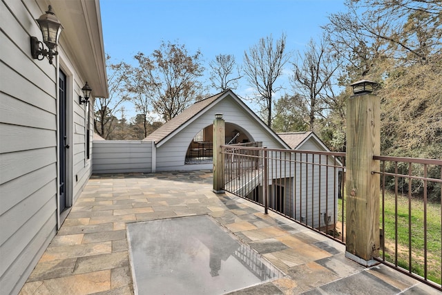 view of patio / terrace with fence