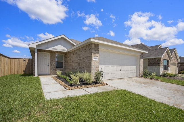 single story home with a garage and a front lawn