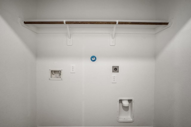 washroom with gas dryer hookup, washer hookup, and hookup for an electric dryer