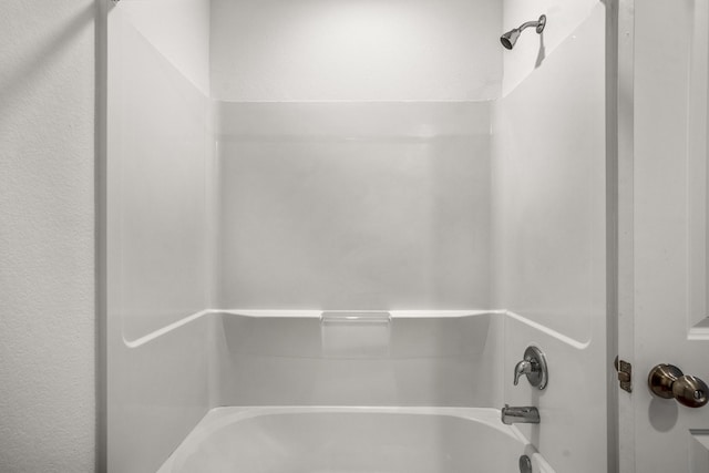 bathroom with shower / bathtub combination